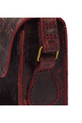 Detail zijbevestiging en bloemreliëf Dr. Martens Satchel