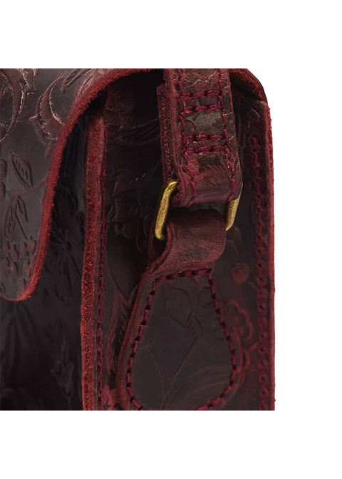 Detail zijbevestiging en bloemreliëf Dr. Martens Satchel