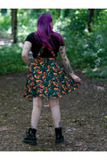 Run & Fly Squirrel pinafore swing jurk zwart met eekhoorns en bladeren